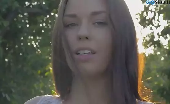 Outdoor Seduction Brunette Beauty in White Dress Teasing Sensual Delights